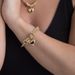 pulseira portuguesa com coração em ouro 750 para mulheres
