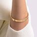 Bracelete-Feminino-em-Ouro-18K-Liso-com-Acabamento-Interno-e-6mm