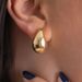Brinco-gota-organico-em-ouro-10k
